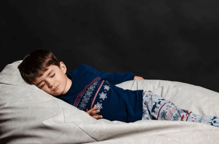 A child sleeping peacefully in organic pajamas