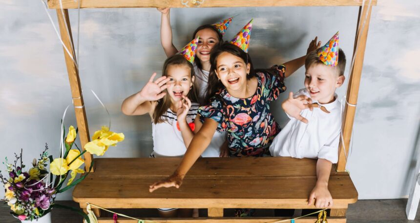 Kids-laughing-and-sitting-inside-a-homemade-fort-scaled