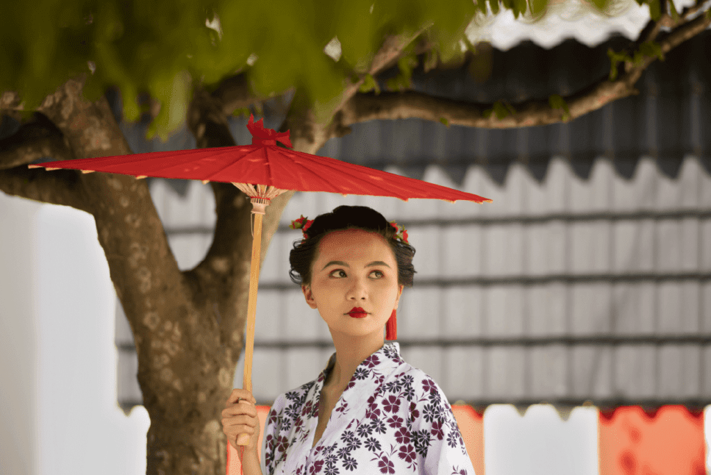 A little girl wearing a yukata with a floral pattern