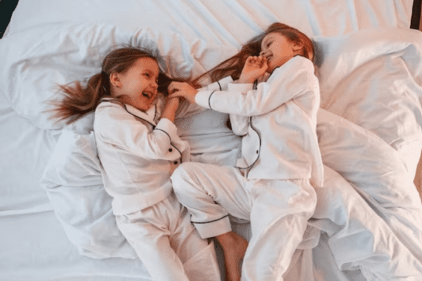 A pair of pure cotton pajamas spread out on a bed