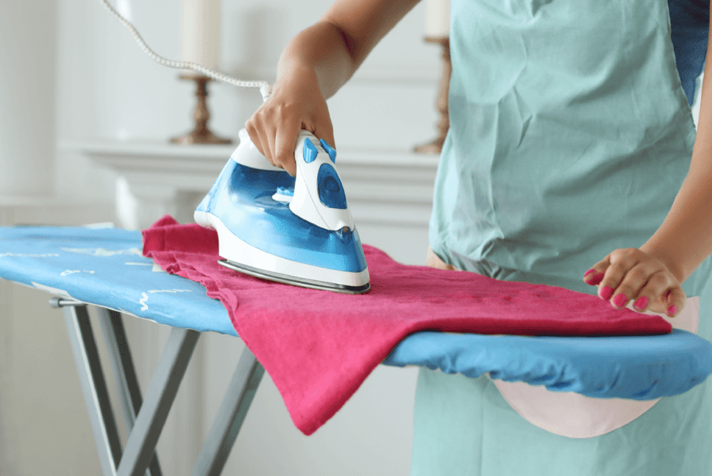 Bright patches being ironed onto a pajama