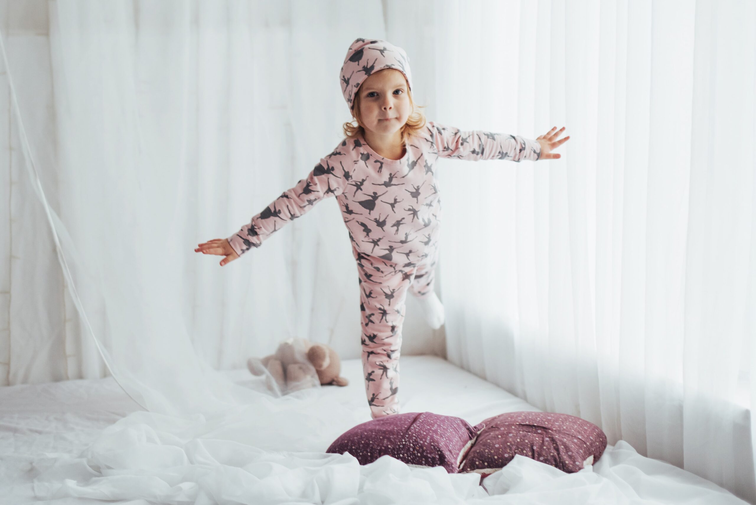 Child easily slipping into a pajama