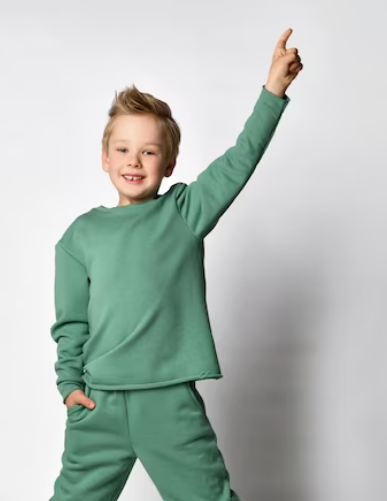 Child proudly showing off their stylish pajamas