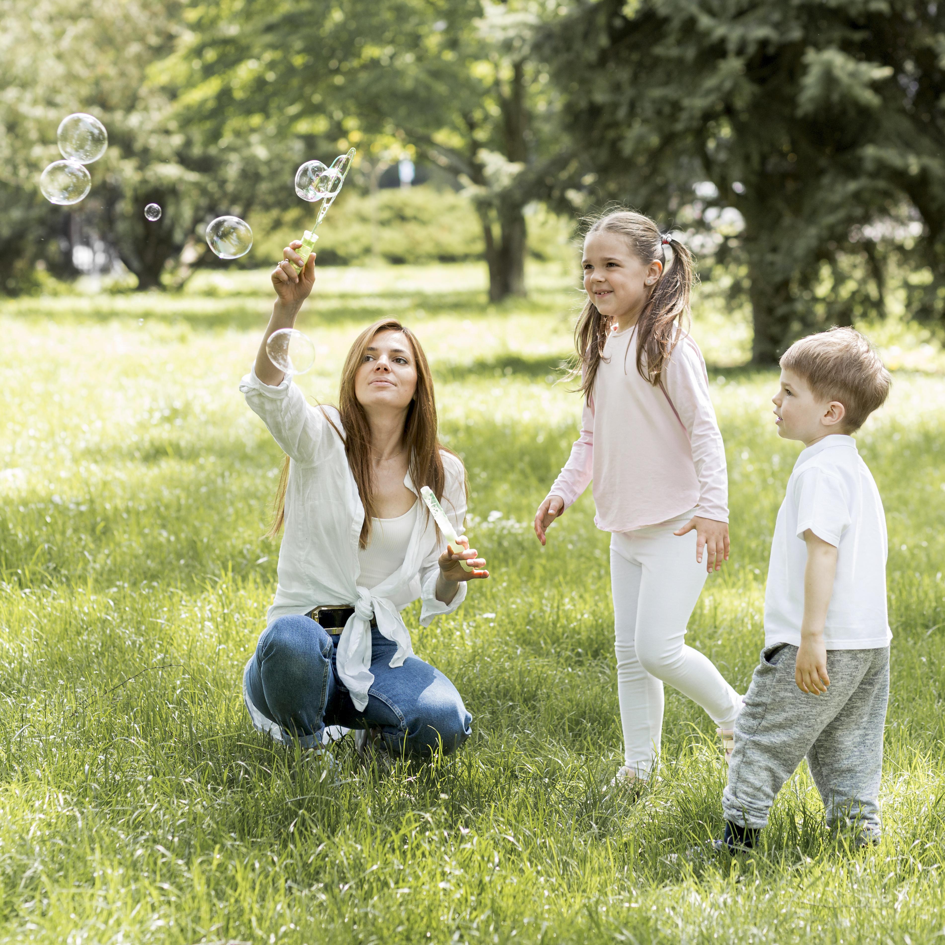 Kids playing in the garden during sunrise in their pajamas