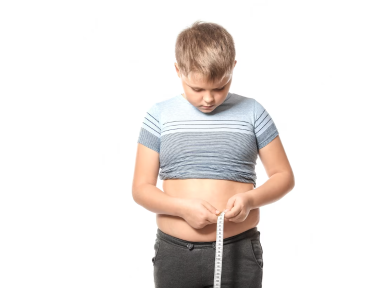 Measuring the widest part of the child's hips