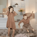 Old photos of children playing in classic sleepwear styles