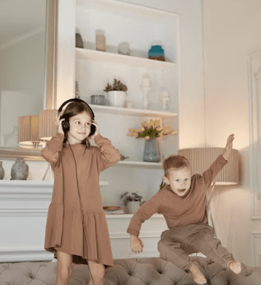 Old photos of children playing in classic sleepwear styles