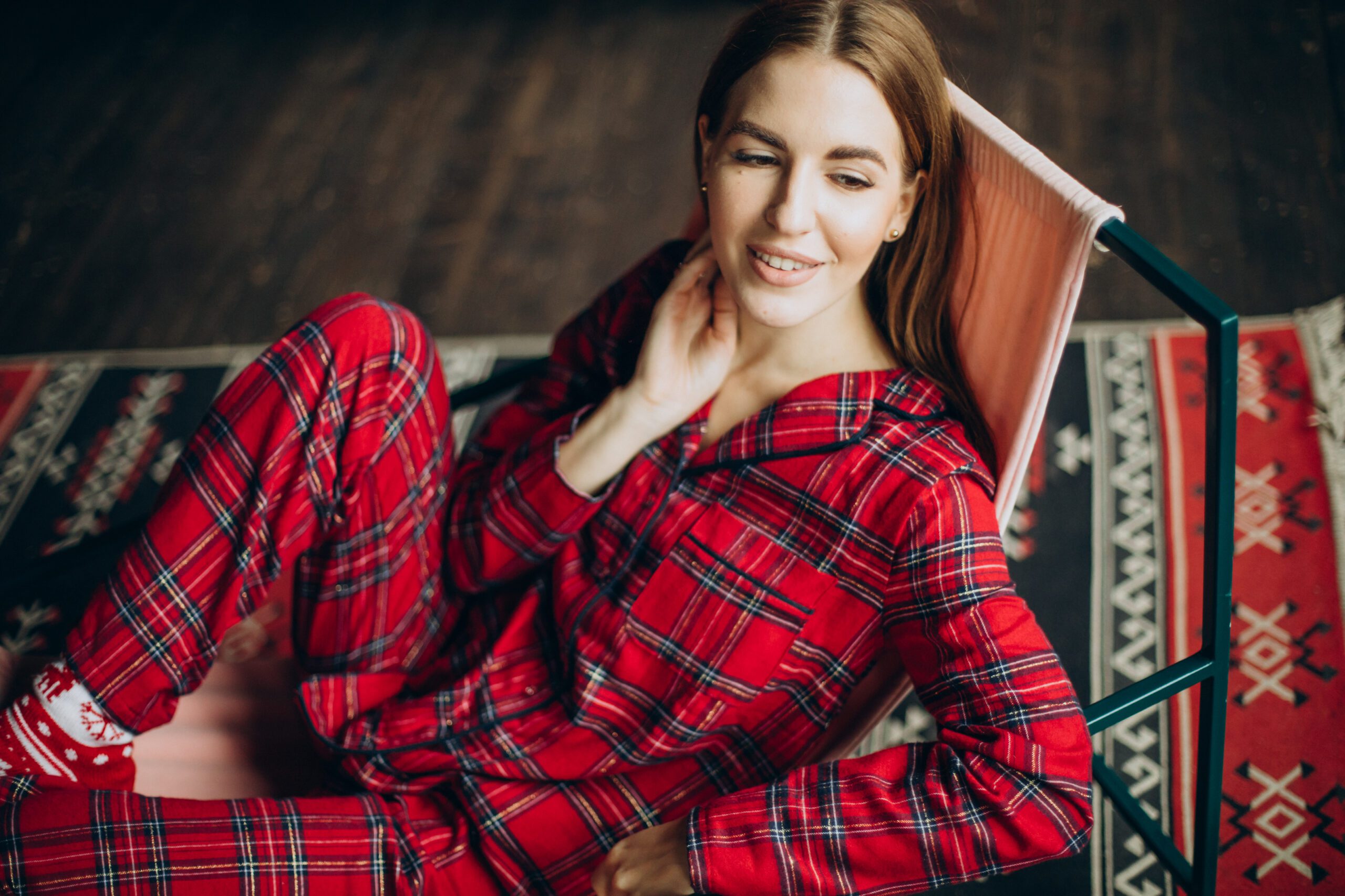 Teenager wearing plaid flannel pajamas