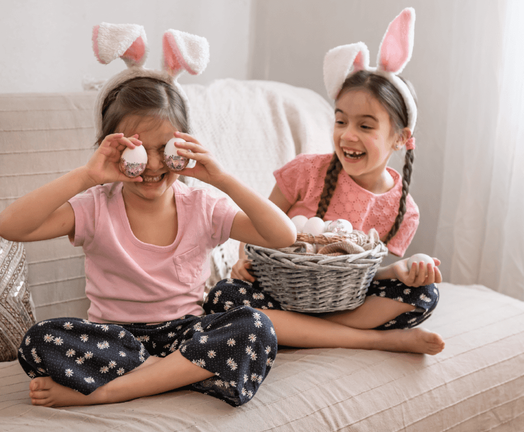 Two kids playing pretend dressed in fantasy themed pajamas